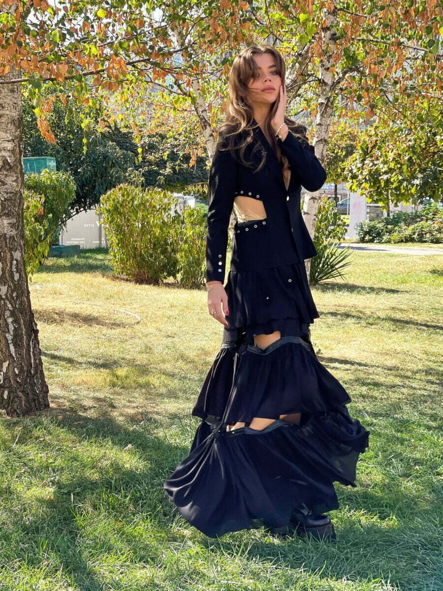 Long skirt with cutouts and leather